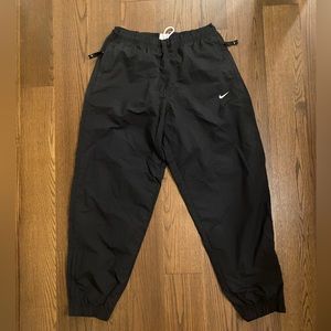 Nike Swoosh track Pants BRAND NEW without tags. Never worn L